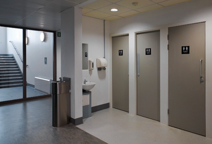 Handwash basins for the unisex toilets are in an open area to avoid bullying